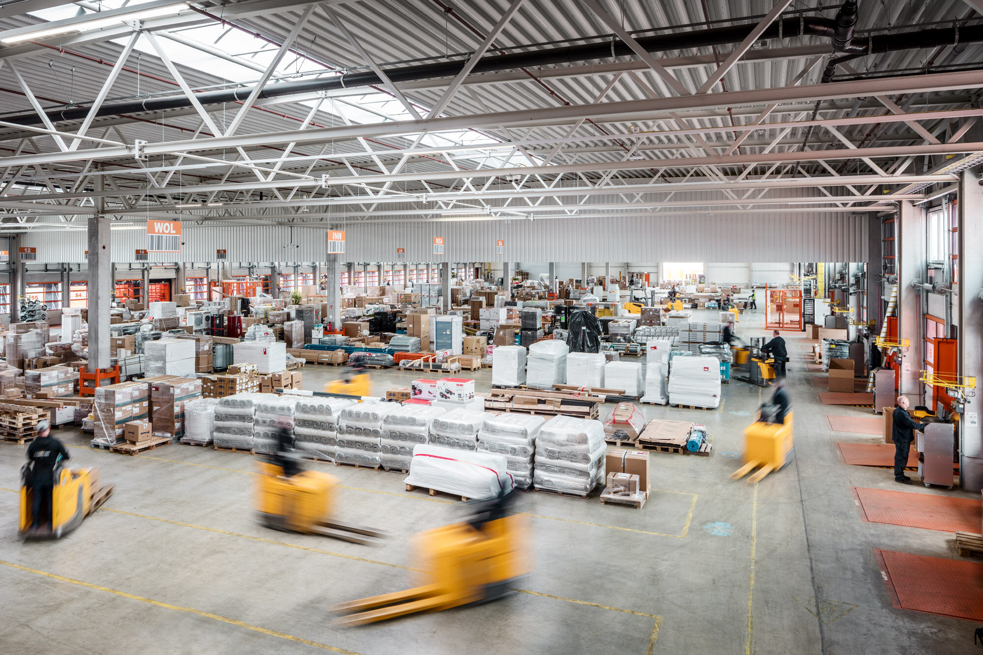 Forklift operators and warehouse teams at Gebrüder Weiss manage high-volume fulfillment with precision and efficiency.